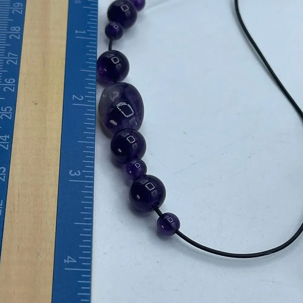 Amethyst cord beaded necklace 12” drop.